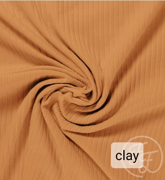 Flared - Brede rib - Clay